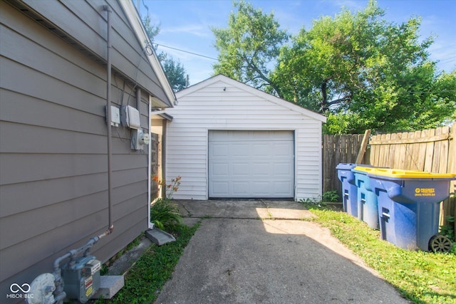 8047 E 48th St, Indianapolis, IN 46226 - detached garage featuring asphalt driveway