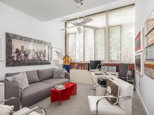 430 N Park Ave Unit 104, Indianapolis, IN 46202 - living area featuring carpet, healthy amount of natural light, and ceiling fan