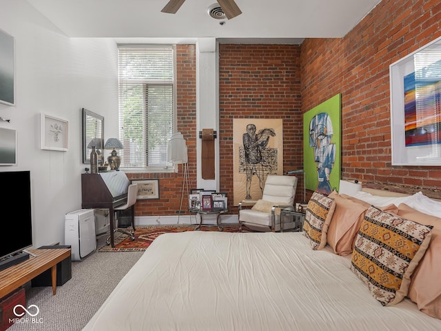 430 N Park Ave Unit 104, Indianapolis, IN 46202 - bedroom featuring brick wall, carpet floors, and a ceiling fan