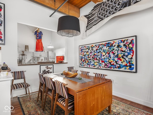 430 N Park Ave Unit 104, Indianapolis, IN 46202 - dining area featuring wood finished floors and baseboards