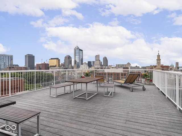 430 N Park Ave Unit 104, Indianapolis, IN 46202 - wooden deck featuring a view of skyline