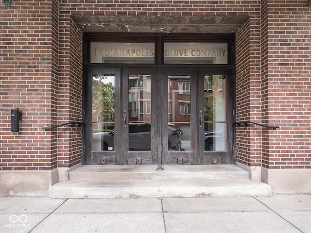 430 N Park Ave Unit 104, Indianapolis, IN 46202 - doorway to property with french doors and brick siding