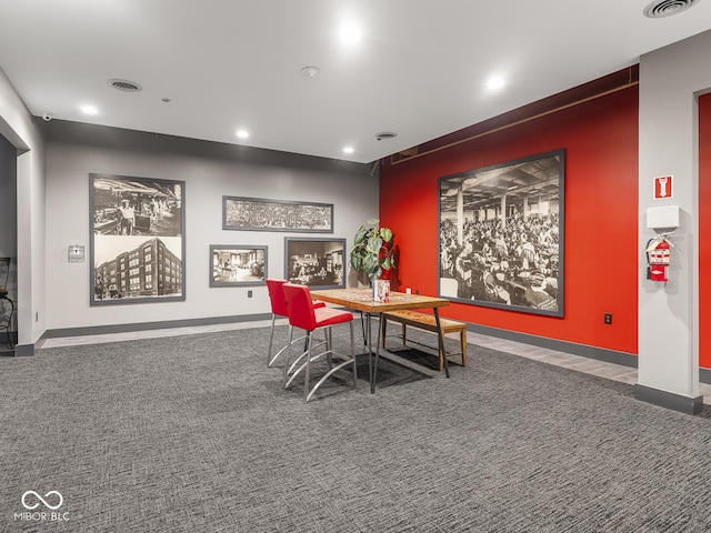 430 N Park Ave Unit 104, Indianapolis, IN 46202 - rec room with recessed lighting, an accent wall, and carpet