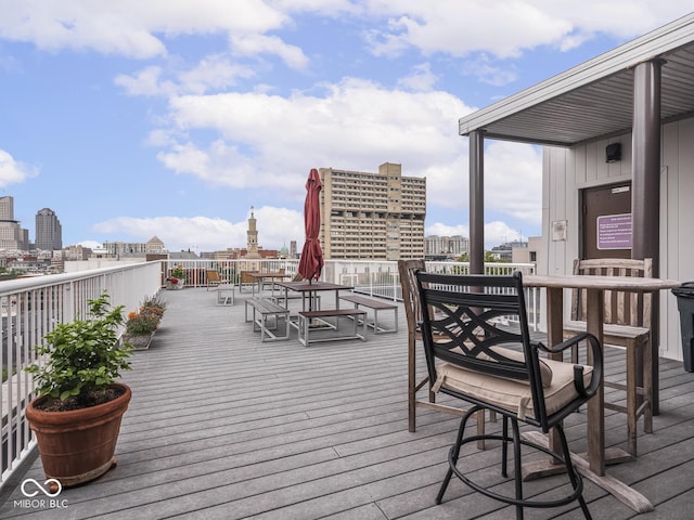 430 N Park Ave Unit 104, Indianapolis, IN 46202 - wooden terrace featuring a city view