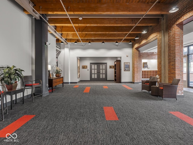 430 N Park Ave Unit 104, Indianapolis, IN 46202 - lobby with brick wall and beamed ceiling