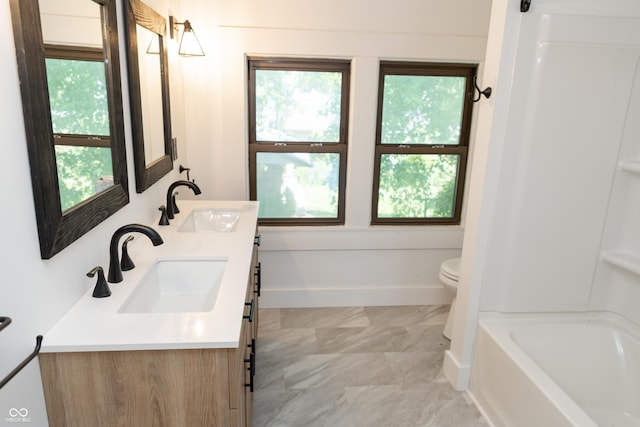 602 Valley Dr, Crawfordsville, IN 47933 - full bath with double vanity and shower / bath combination