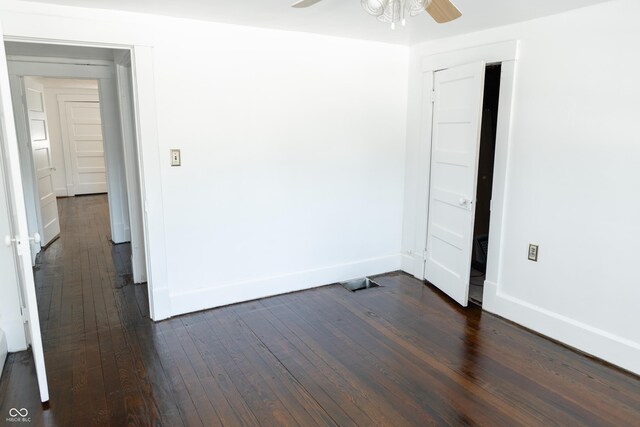 602 Valley Dr, Crawfordsville, IN 47933 - empty room featuring ceiling fan and dark wood-type flooring