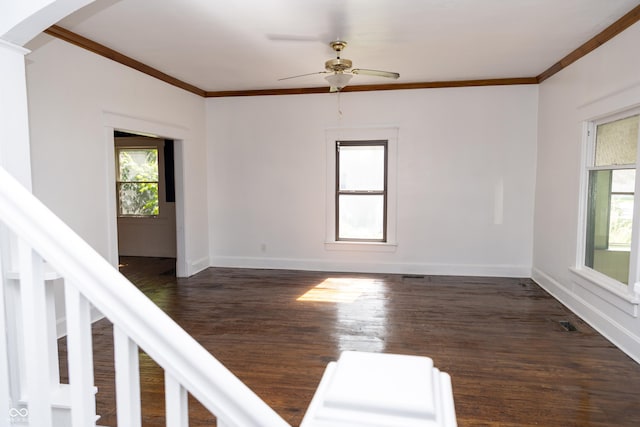 602 Valley Dr, Crawfordsville, IN 47933 - unfurnished room with ornamental molding, arched walkways, ceiling fan, and dark wood-type flooring