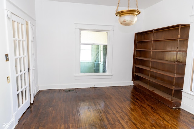 602 Valley Dr, Crawfordsville, IN 47933 - spare room featuring wood finished floors and baseboards