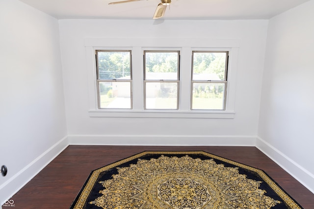 602 Valley Dr, Crawfordsville, IN 47933 - spare room with dark wood-style floors and ceiling fan