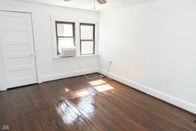 602 Valley Dr, Crawfordsville, IN 47933 - empty room with dark wood finished floors, ceiling fan, and cooling unit