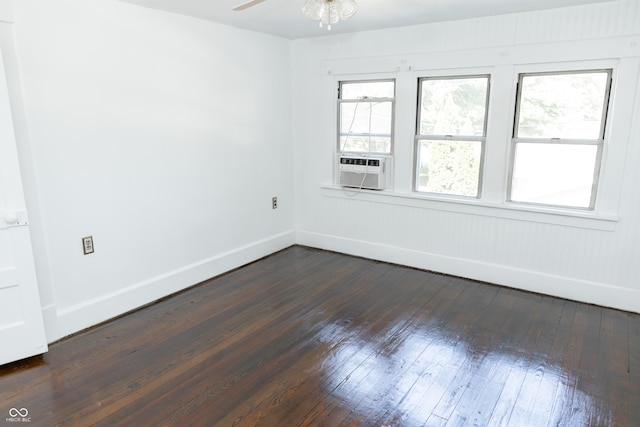 602 Valley Dr, Crawfordsville, IN 47933 - spare room featuring cooling unit, dark wood-style flooring, and ceiling fan