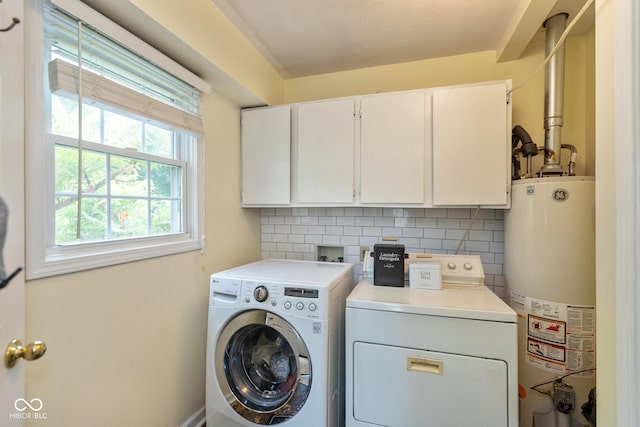 921 Morgan Dr, Indianapolis, IN 46227 - laundry room with gas water heater, separate washer and dryer, and cabinet space