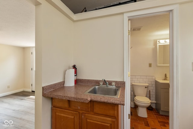 921 Morgan Dr, Indianapolis, IN 46227 - bathroom featuring vanity and tile walls