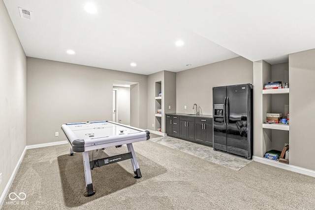 14293 Dufton Ct, Carmel, IN 46074 - game room with light carpet, recessed lighting, and wet bar