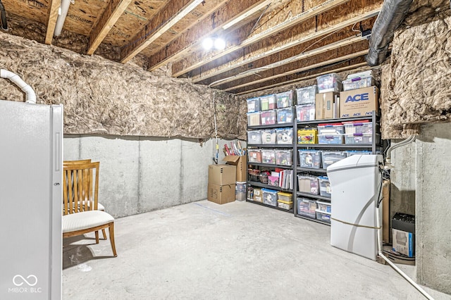14293 Dufton Ct, Carmel, IN 46074 - unfinished below grade area with freestanding refrigerator
