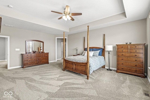 14293 Dufton Ct, Carmel, IN 46074 - bedroom featuring carpet, a raised ceiling, and a ceiling fan