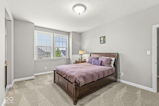 14293 Dufton Ct, Carmel, IN 46074 - bedroom featuring carpet floors and a textured ceiling