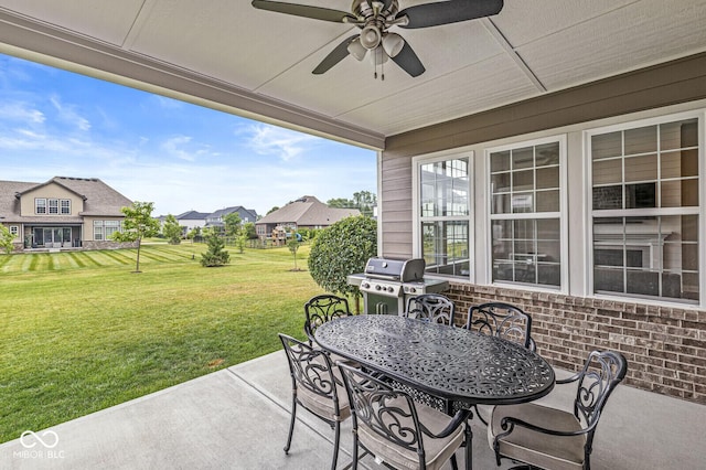 14293 Dufton Ct, Carmel, IN 46074 - view of patio featuring area for grilling, a ceiling fan, outdoor dining area, and a residential view