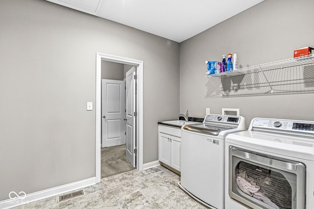 14293 Dufton Ct, Carmel, IN 46074 - washroom featuring separate washer and dryer and cabinet space