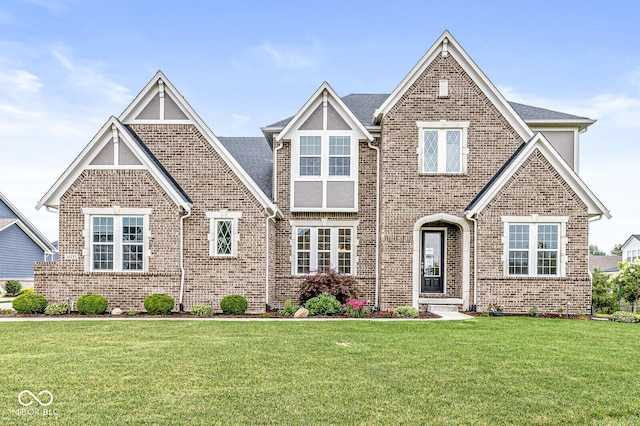 14293 Dufton Ct, Carmel, IN 46074 - view of front of property featuring brick siding and a front yard