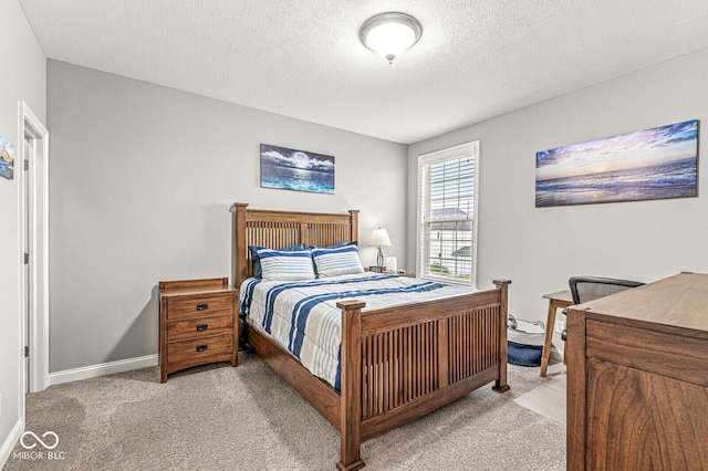 14293 Dufton Ct, Carmel, IN 46074 - carpeted bedroom featuring baseboards and a textured ceiling