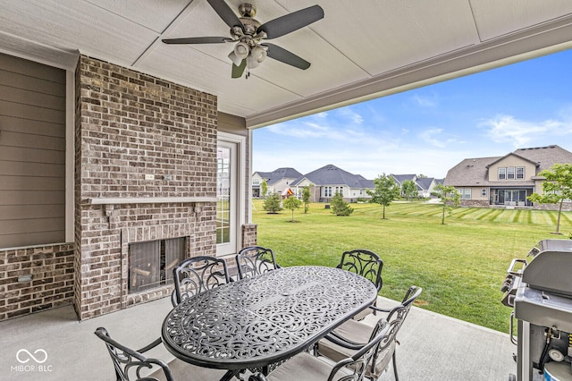 14293 Dufton Ct, Carmel, IN 46074 - view of patio with an outdoor brick fireplace, a residential view, grilling area, a ceiling fan, and outdoor dining space