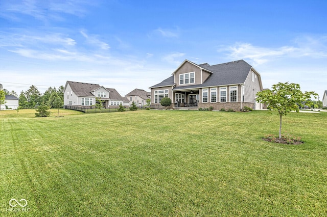14293 Dufton Ct, Carmel, IN 46074 - view of front facade featuring a front lawn and brick siding