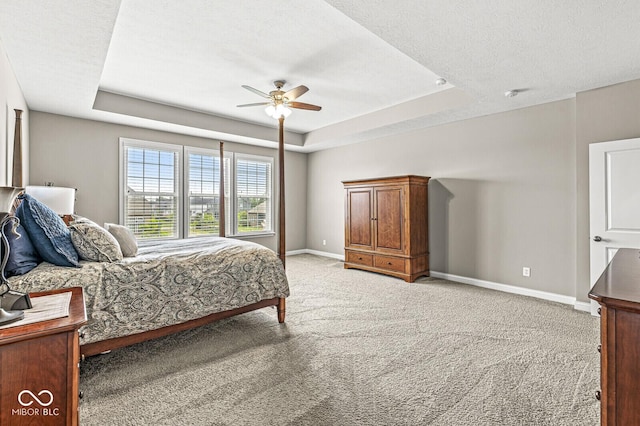 14293 Dufton Ct, Carmel, IN 46074 - bedroom featuring light colored carpet, a raised ceiling, and ceiling fan