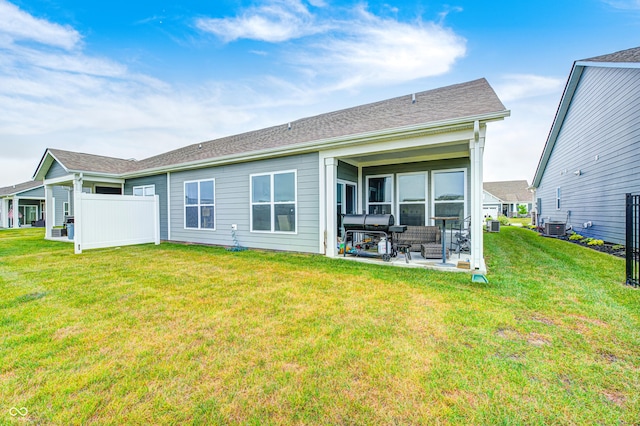 8108 Nik St, Brownsburg, IN 46112 - back of house featuring a lawn, a patio, and an outdoor hangout area