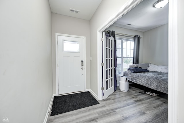 8108 Nik St, Brownsburg, IN 46112 - entryway with wood finished floors and plenty of natural light