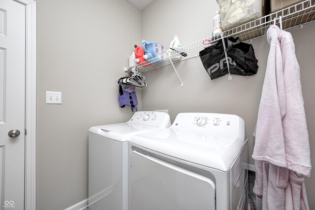 8108 Nik St, Brownsburg, IN 46112 - washroom featuring washer and clothes dryer and baseboards