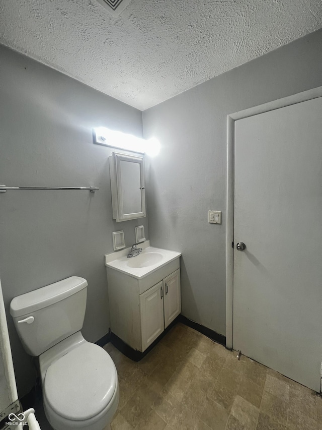 3525 Luewan Ct, Indianapolis, IN 46235 - half bathroom with vanity and a textured ceiling