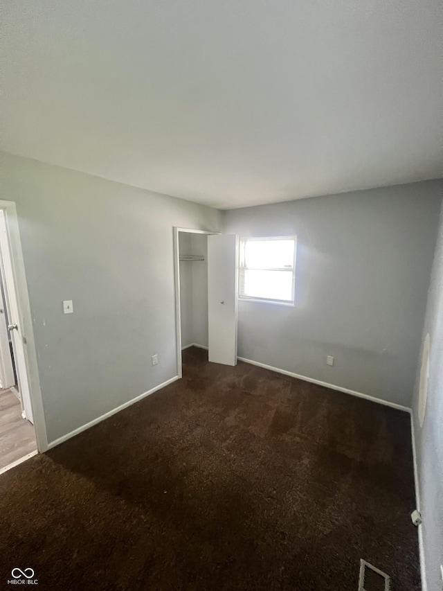 3525 Luewan Ct, Indianapolis, IN 46235 - unfurnished bedroom featuring carpet flooring and a closet