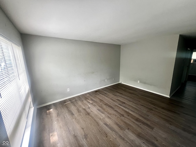 3525 Luewan Ct, Indianapolis, IN 46235 - unfurnished room with dark wood finished floors and baseboards