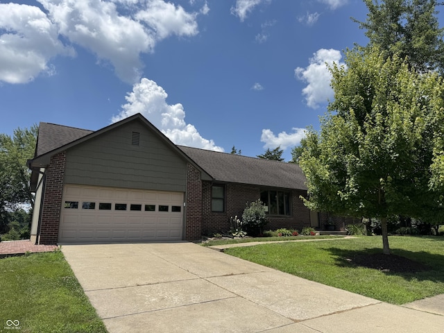 1220 Countryside Ln, Columbus, IN 47201 - ranch-style house with driveway, a garage, brick siding, and a front yard