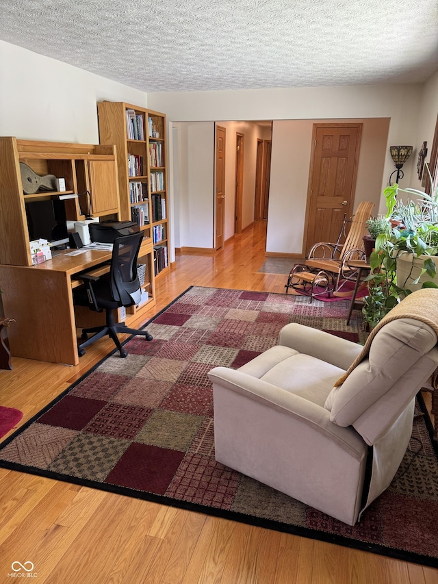 1220 Countryside Ln, Columbus, IN 47201 - office space featuring wood finished floors and a textured ceiling