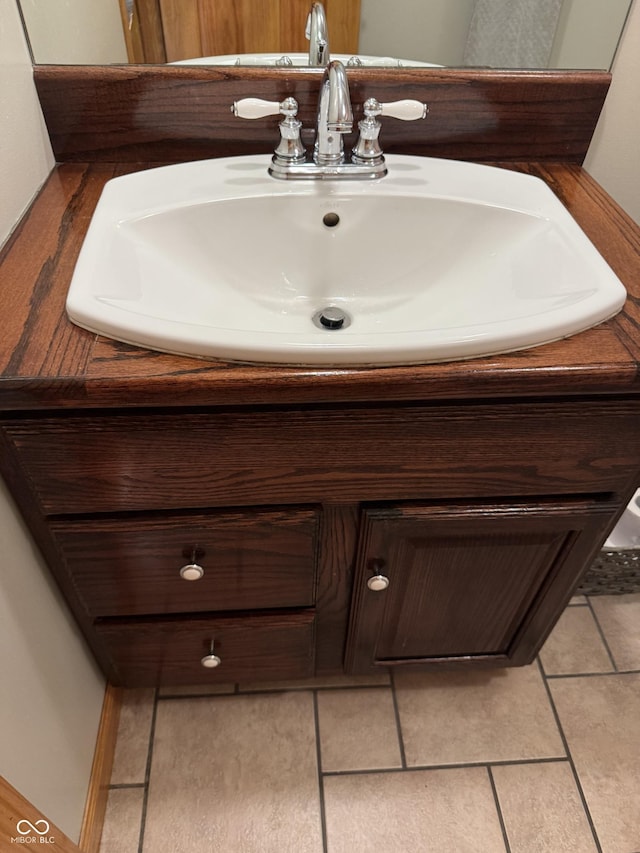 1220 Countryside Ln, Columbus, IN 47201 - bathroom featuring vanity and tile patterned floors