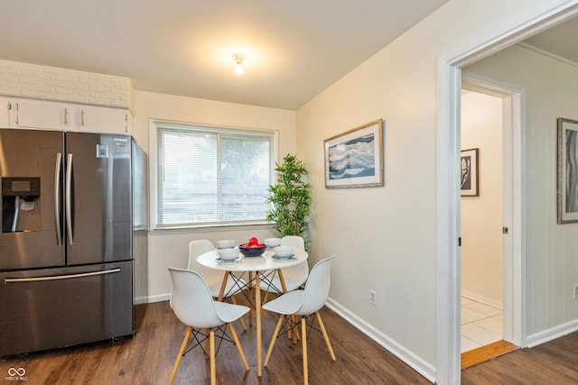 5702 E 17th St, Indianapolis, IN 46218 - dining room featuring dark wood-style floors and baseboards
