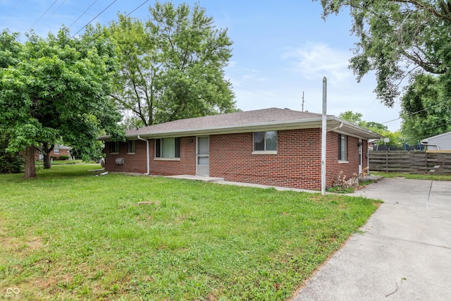 5702 E 17th St, Indianapolis, IN 46218 - single story home featuring brick siding