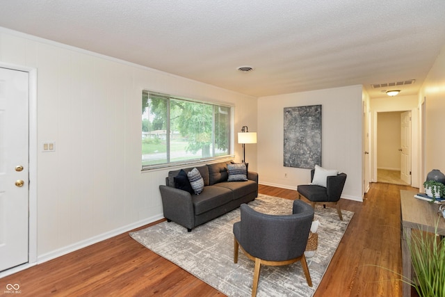5702 E 17th St, Indianapolis, IN 46218 - living room with wood finished floors and baseboards