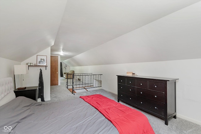 47 Habig Rd, Indianapolis, IN 46217 - carpeted bedroom featuring vaulted ceiling and baseboards