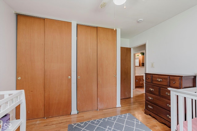 47 Habig Rd, Indianapolis, IN 46217 - bedroom with two closets and light wood-type flooring