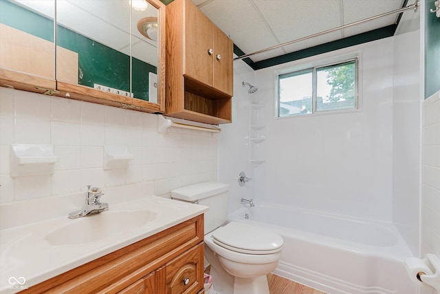 47 Habig Rd, Indianapolis, IN 46217 - bathroom featuring tub / shower combination, vanity, and decorative backsplash