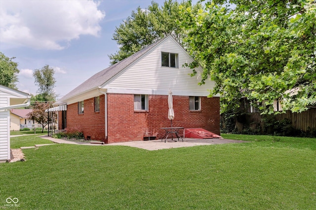 47 Habig Rd, Indianapolis, IN 46217 - rear view of house with brick siding and a patio