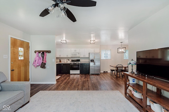 47 Habig Rd, Indianapolis, IN 46217 - living room featuring dark wood-style flooring and ceiling fan