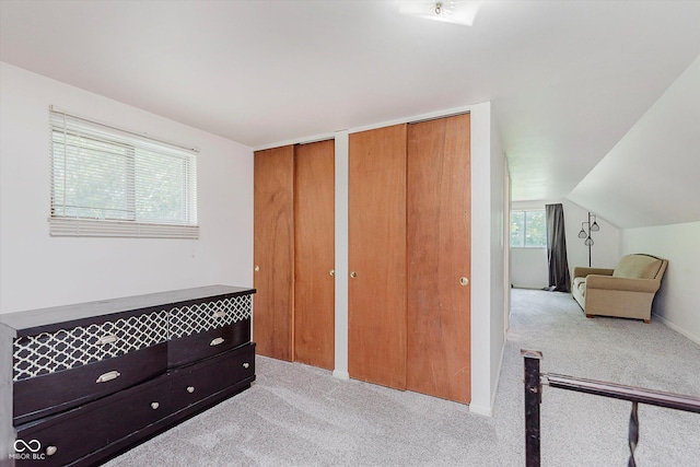 47 Habig Rd, Indianapolis, IN 46217 - carpeted bedroom featuring two closets and vaulted ceiling