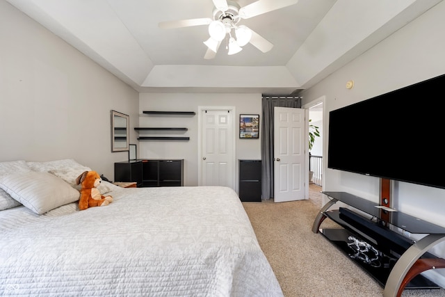 2847 Macintosh, Columbus, IN 47201 - bedroom featuring a tray ceiling, light carpet, and ceiling fan