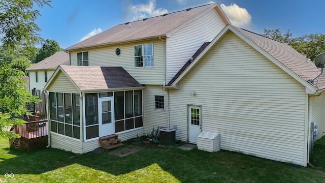 2847 Macintosh, Columbus, IN 47201 - rear view of property featuring a sunroom, a yard, and roof with shingles