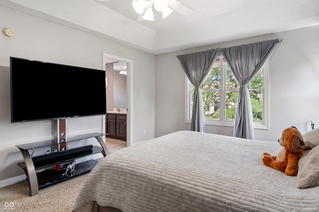 2847 Macintosh, Columbus, IN 47201 - bedroom featuring connected bathroom, a raised ceiling, light tile patterned floors, and a ceiling fan